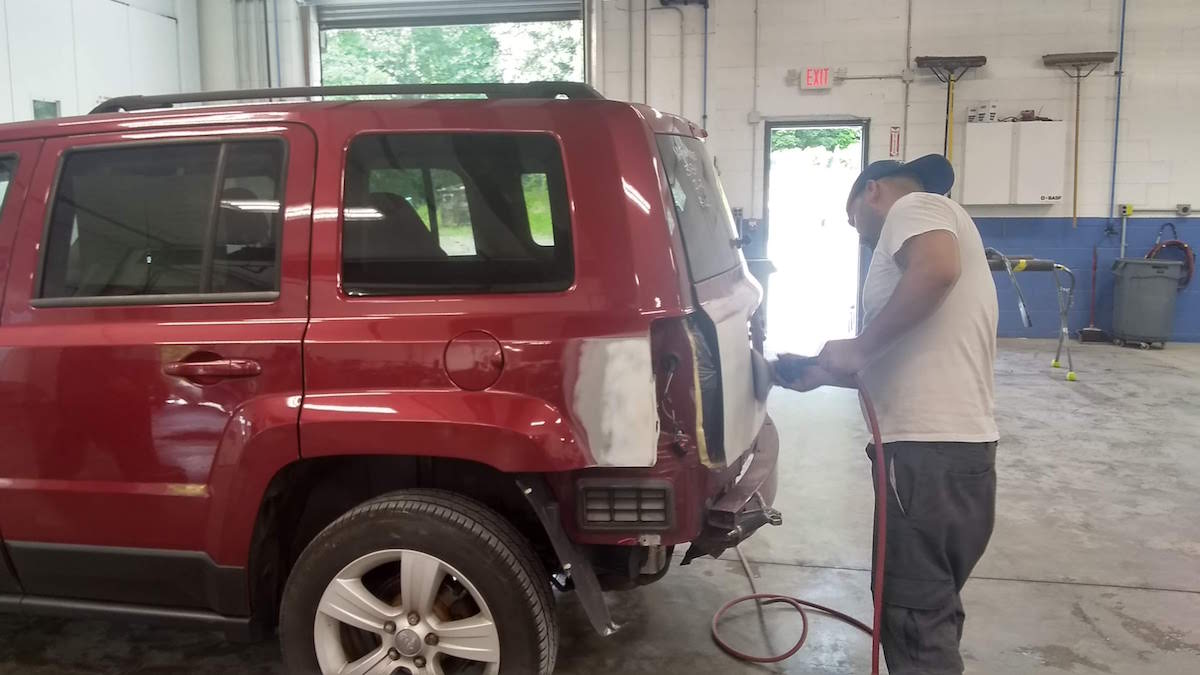 Jeep collision repair preparation work at Fishkill Auto Body in Beacon, NY.